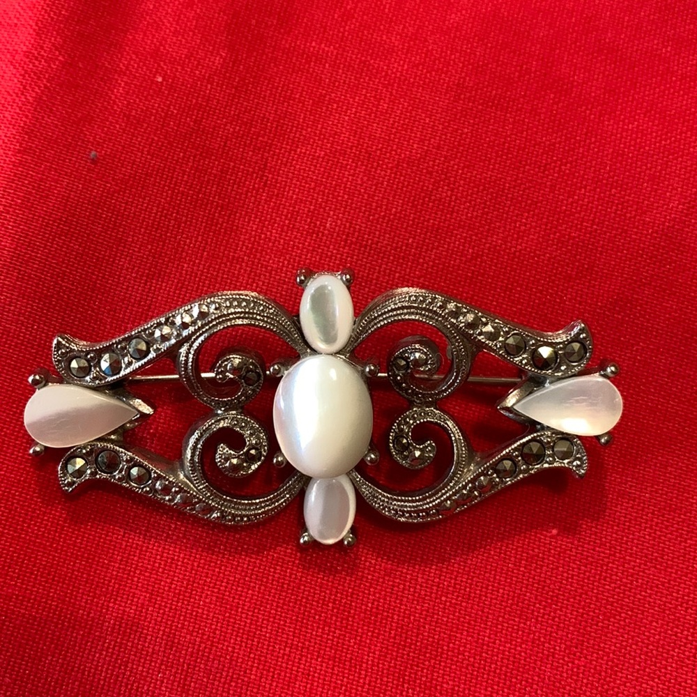 Ornate filigree brooch